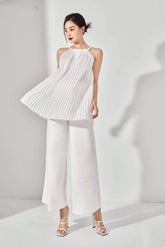 Pleated halter silk top with flowy silhouette and gathered waist detail